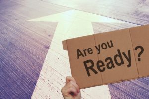 AreyouREADYの文字と道路に矢印が書かれている背景