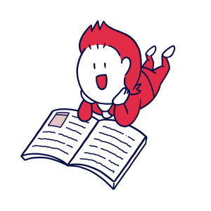 寝転がって本を読むスポ丸