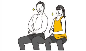 ポーズを取るジムトレーナー